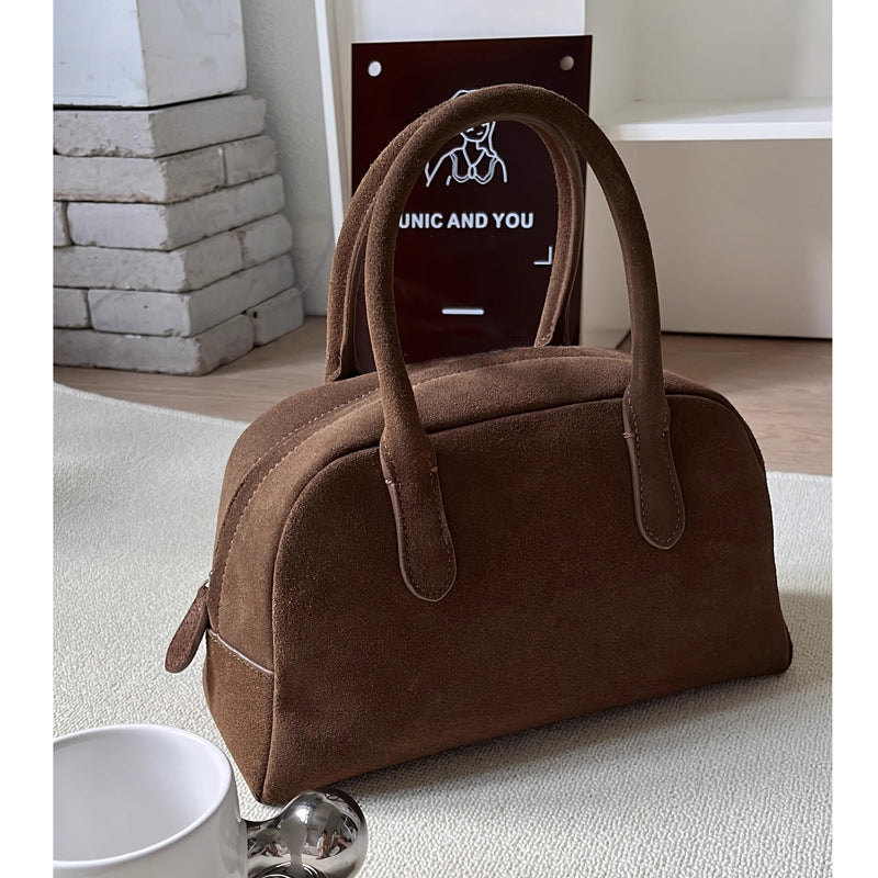 Genuine leather portable Boston bag for women, new bowling niche pillow bag, fashionable retro cowhide bag for women