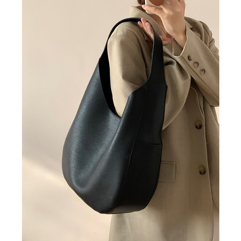 Cowhide Tote Bag Women's 2024 New Single Shoulder Large Capacity Commuting Bucket Bag Genuine Leather Niche Lazy Style Underarm Bag