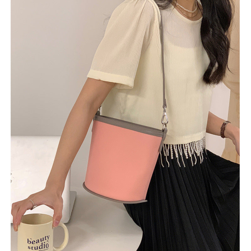 Small bucket bag for women new niche design cowhide shoulder bag fashion contrast color genuine leather women's bag crossbody bag