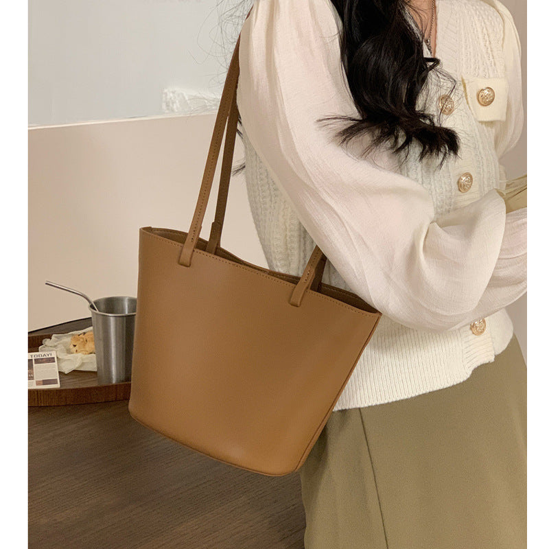 Large capacity tote bag women's new cowhide bag niche simple genuine leather women's bag high-end bucket bag