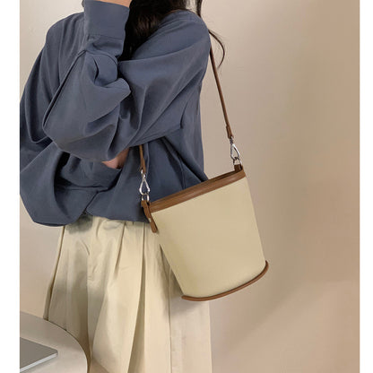 Small bucket bag for women new niche design cowhide shoulder bag fashion contrast color genuine leather women's bag crossbody bag