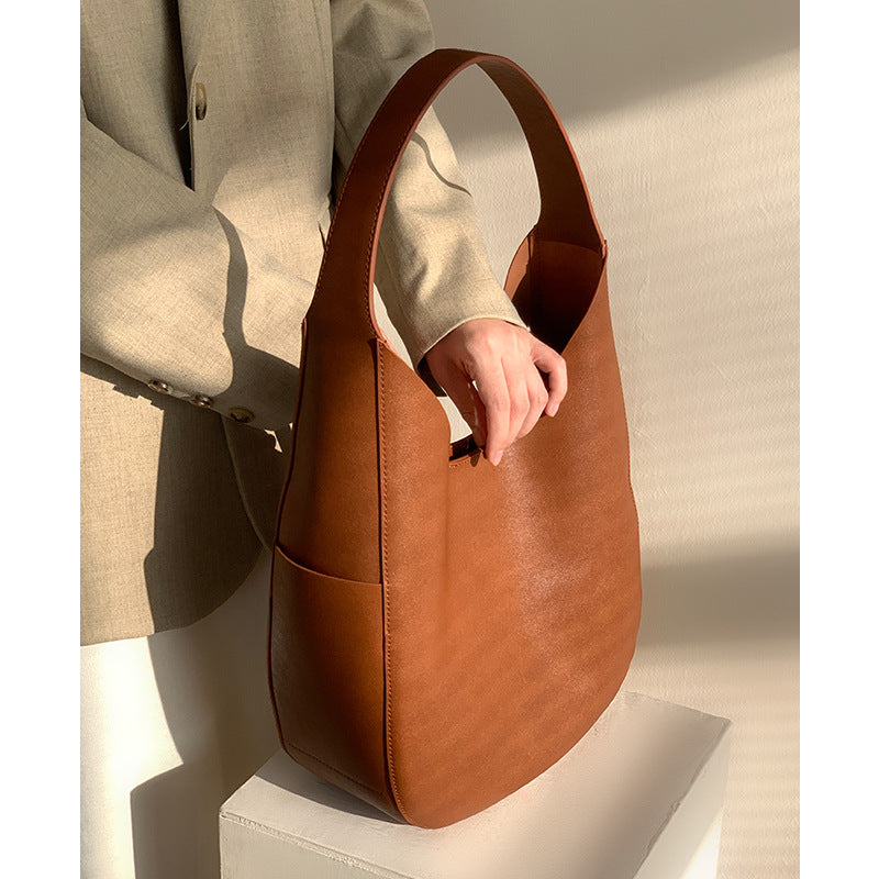 Cowhide Tote Bag Women's 2024 New Single Shoulder Large Capacity Commuting Bucket Bag Genuine Leather Niche Lazy Style Underarm Bag