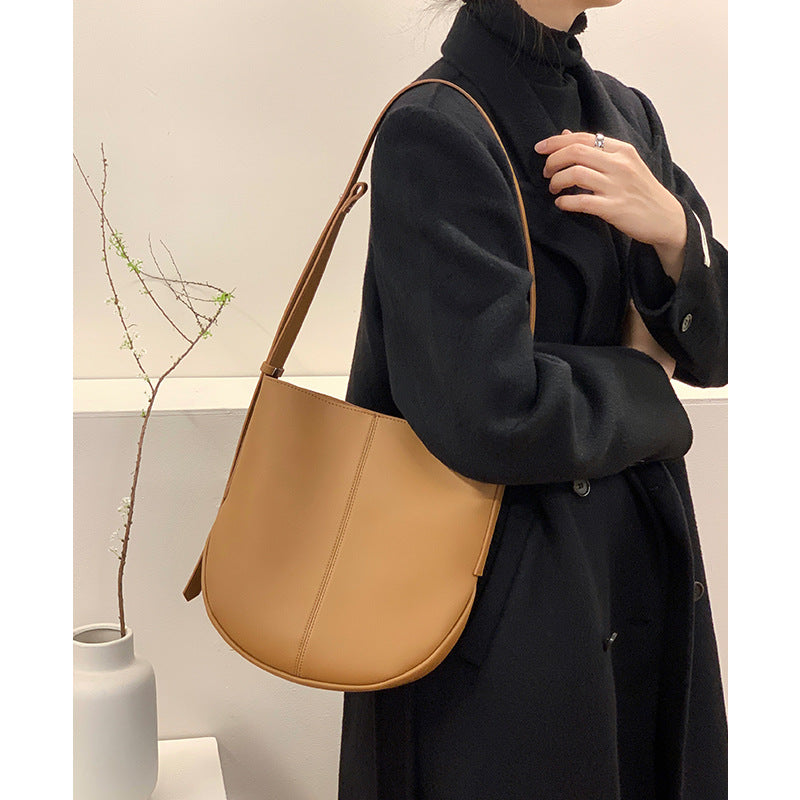 Large capacity cowhide bucket bag women's new simple tote bag commuter women's bag genuine leather crossbody bag shoulder bag